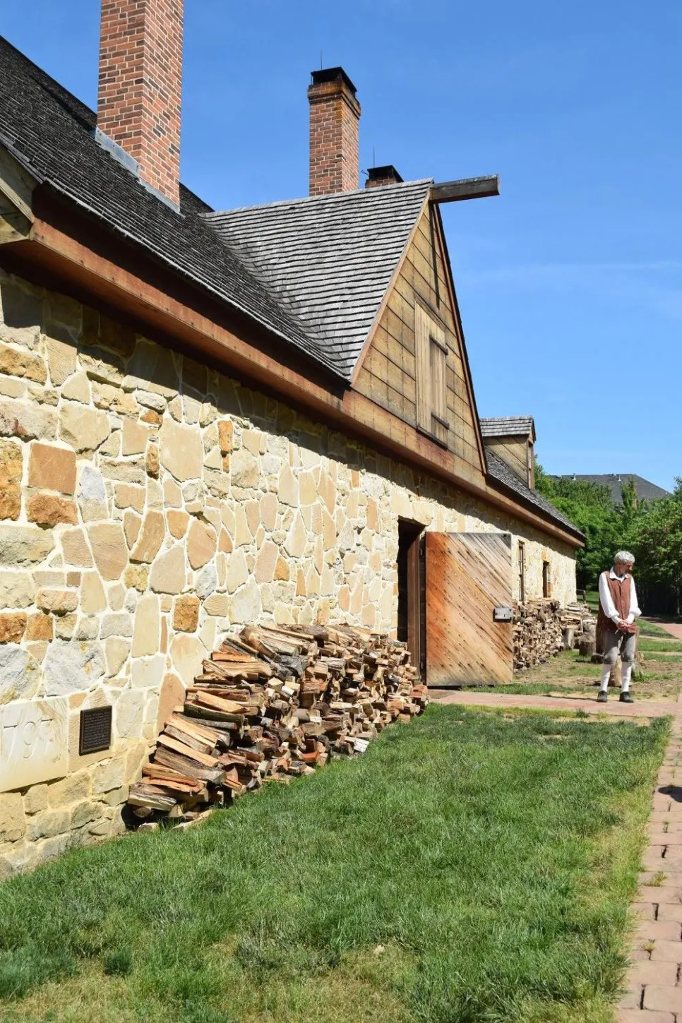 The reconstructed Distillery at Mount Vernon with 1797 plaque